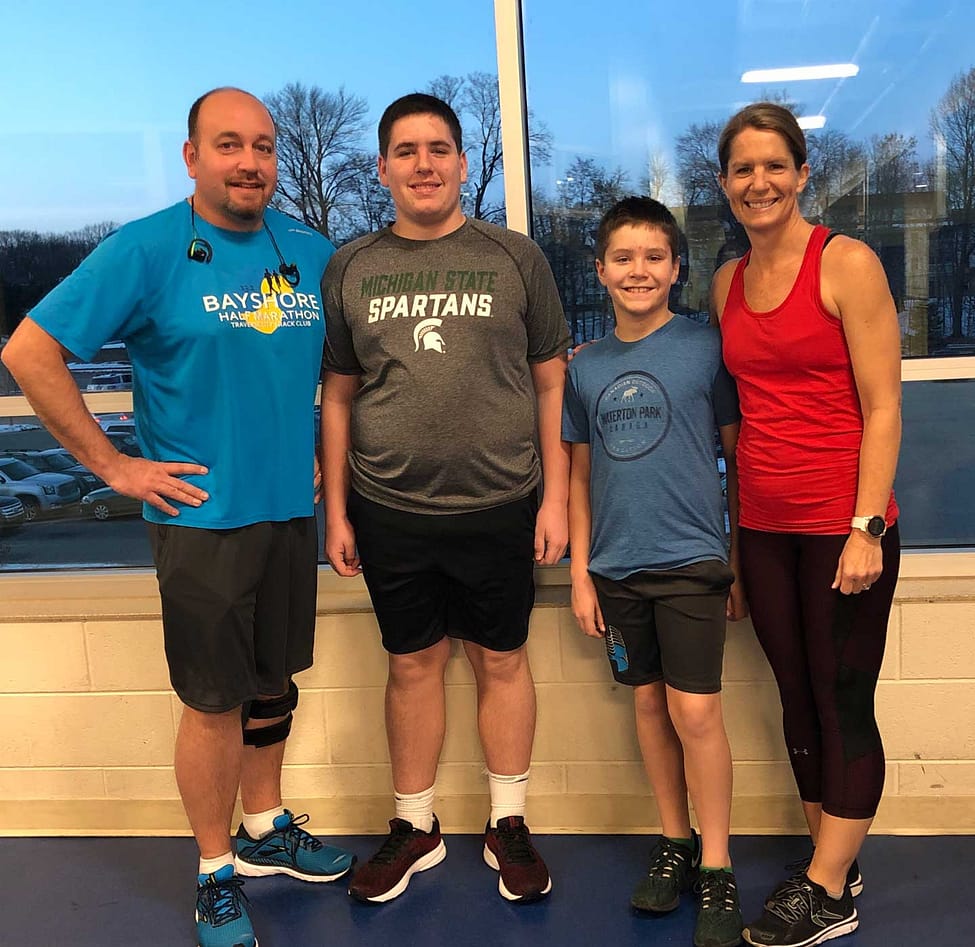 Scott Family running for Hand2Hand at the Amway River Bank Run
